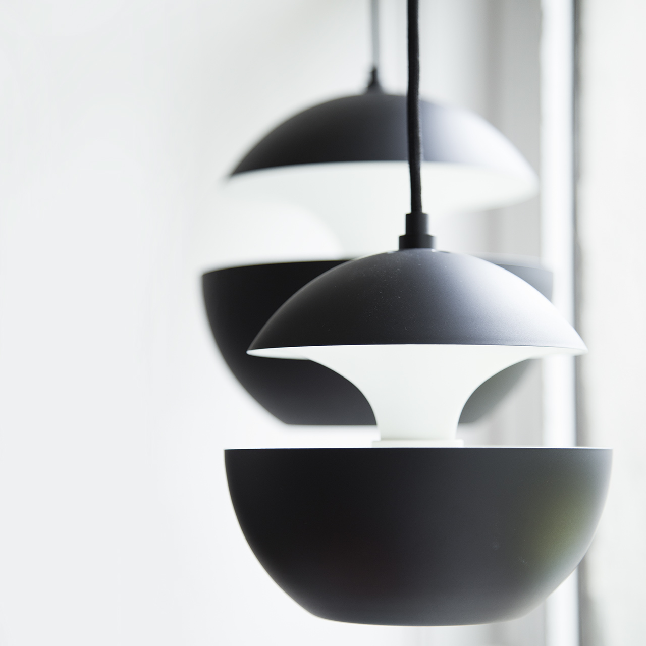 Leuchte Here comes the Sun Schwarz DCW Editions